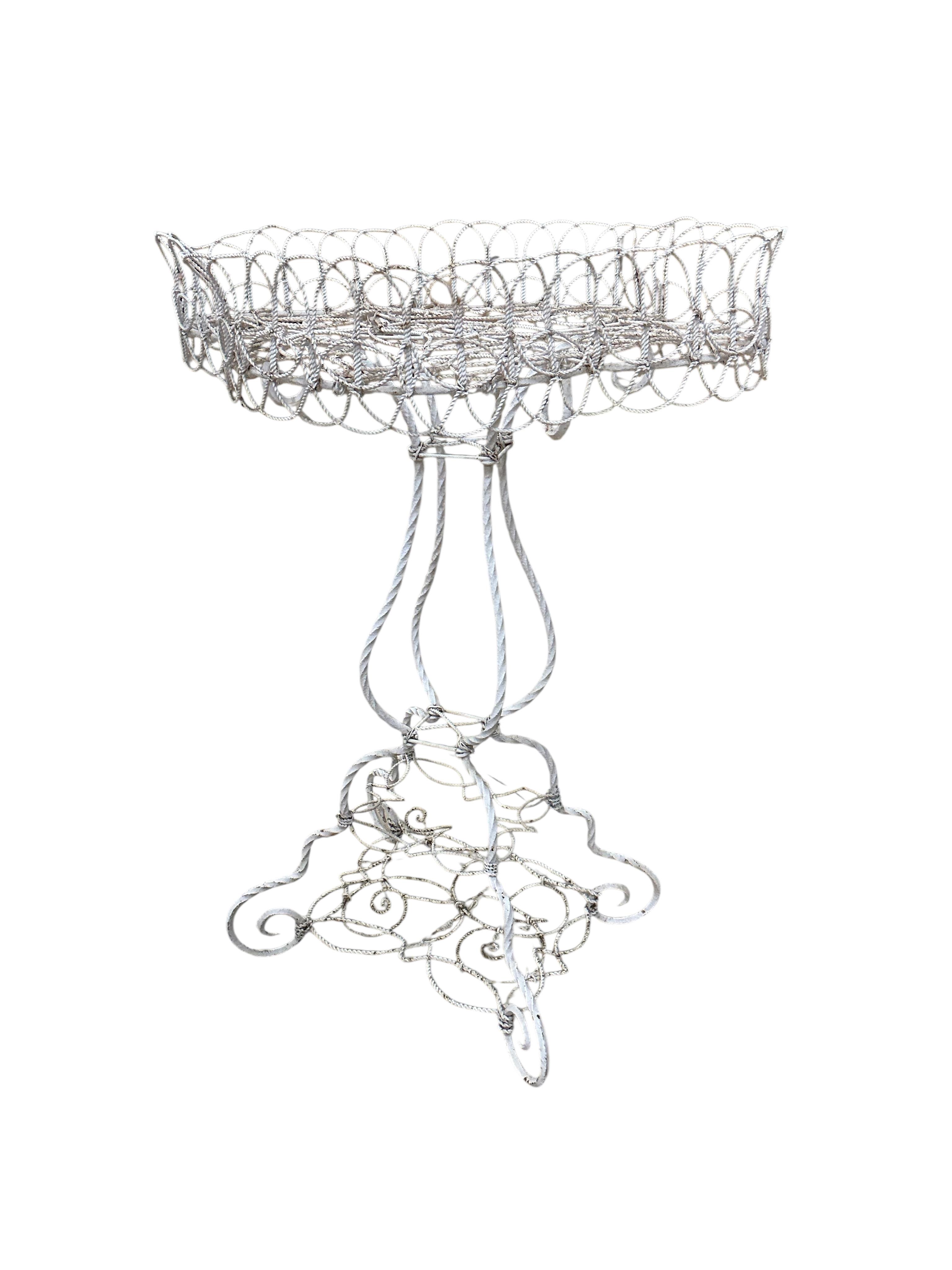 A Victorian wirework plant stand, width 60cm, depth 50cm, height 82cm